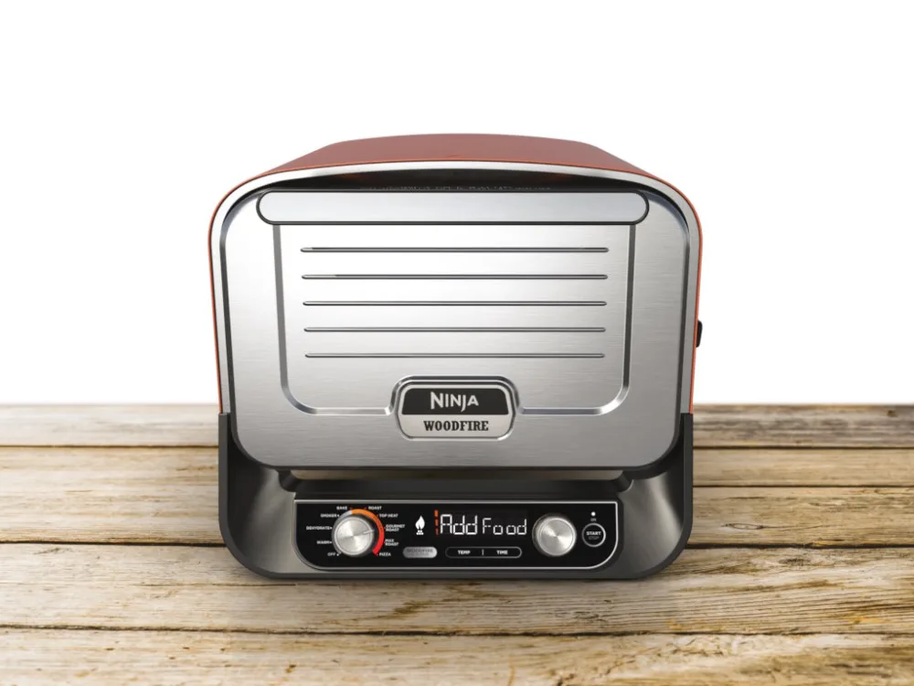 Ninja vanjska pec za pizzu8u1 uredjaj, snaga 2400W,Woodfire tehn. do 30% brze, tezina 22kg,